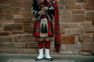 Person wearing a Scottish kilt